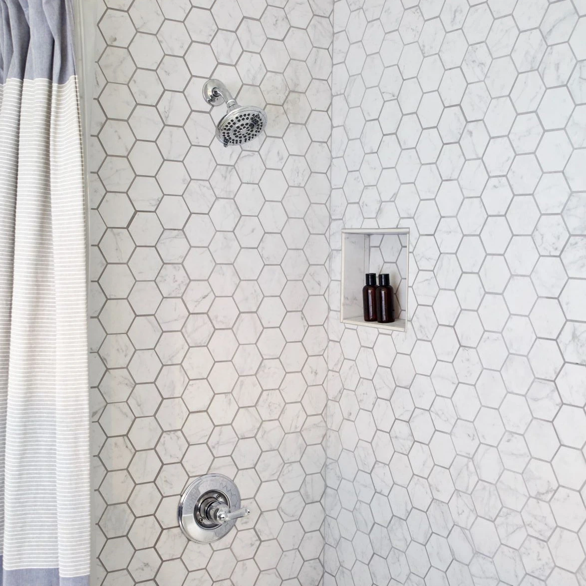 Eon Carrara Honeycomb Mosaic used as shower wall tile