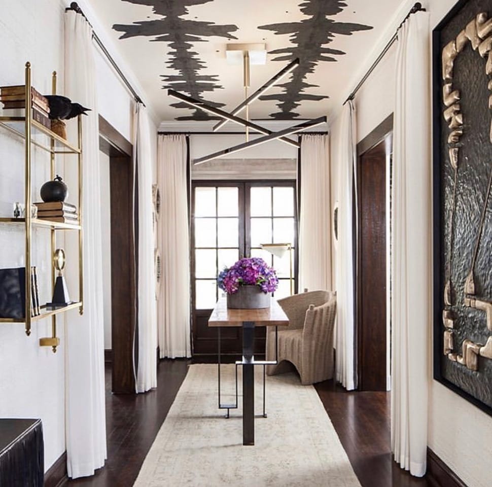 Image of hallway with wallpapered ceiling referenced in the Atlas Concorde USA blog from Porter Teleo