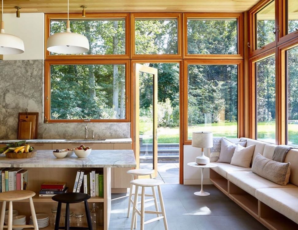 Kitchen with windows image referenced in the Atlas Concorde USA blog from Architectural Digest 