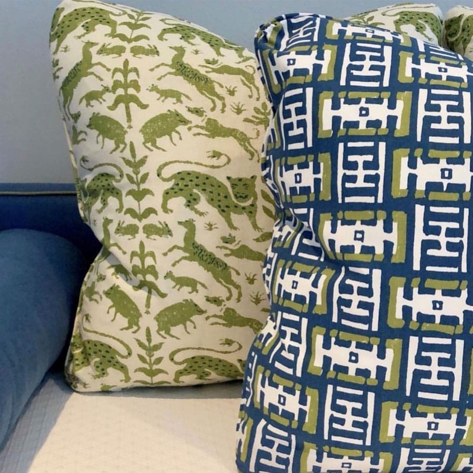 Image of colorful throw pillows referenced in the Atlas Concorde USA blog from JAMES home décor