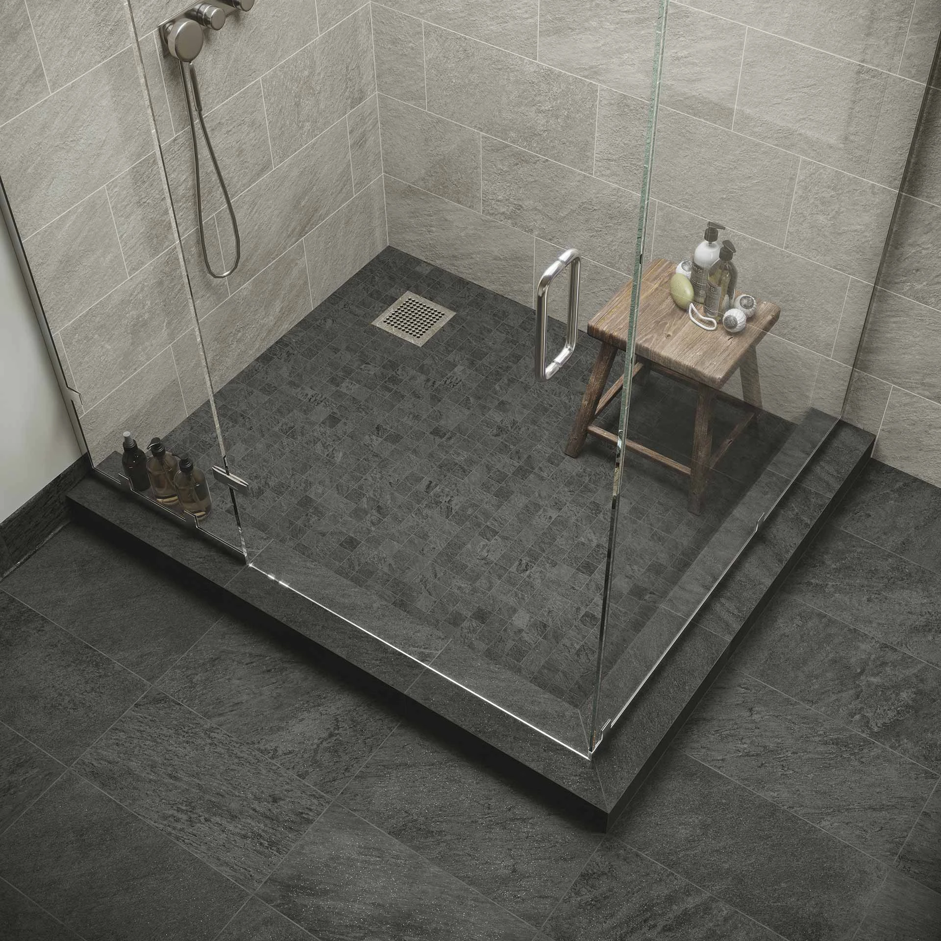 A classic 2x2 mosaic creates an elevated shower floor - Element Carbon Mosaic. 