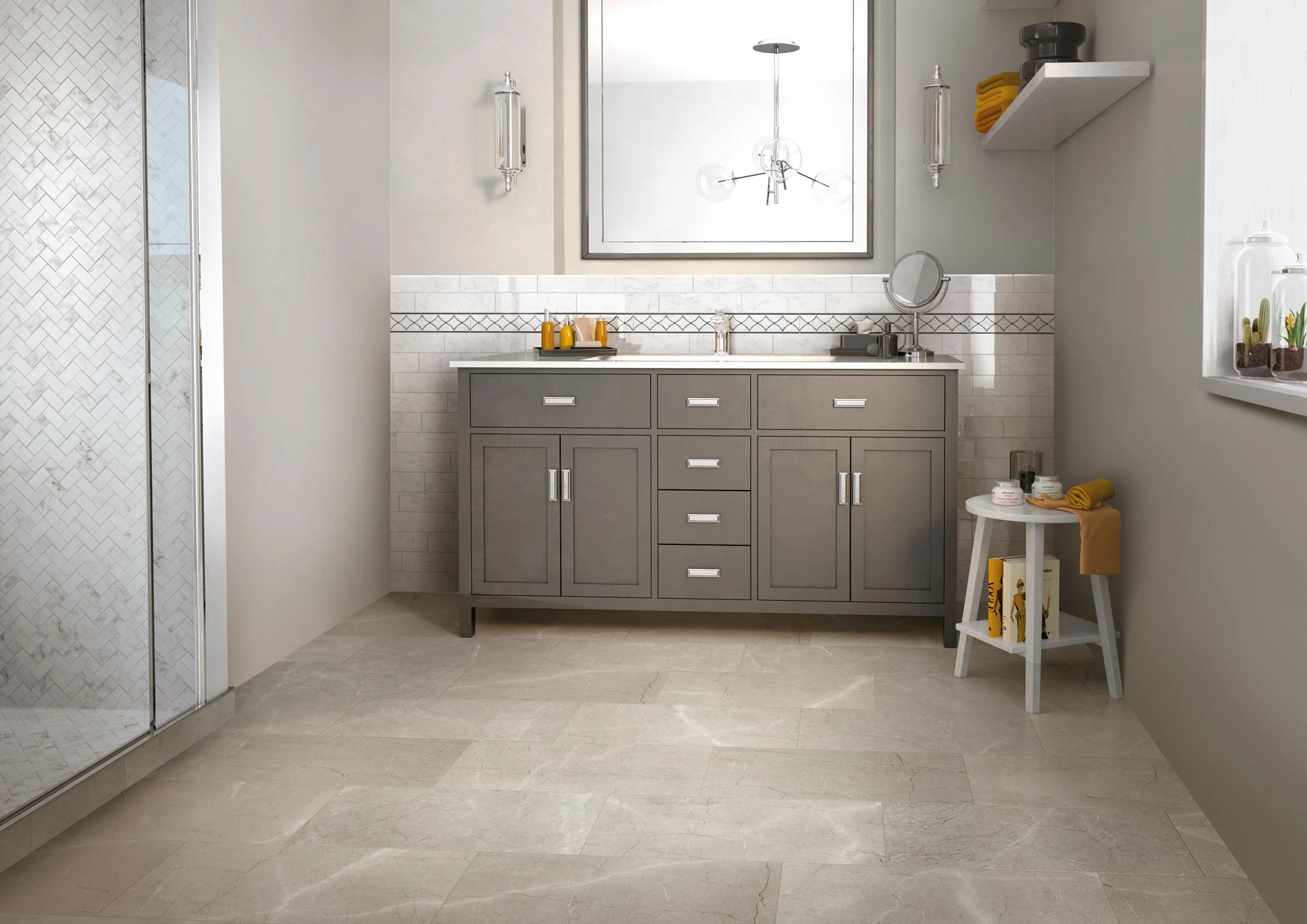 Private residence bathroom with Eon Collection Corinthian Grey marble-look porcelain floor tile, Carrara marble-look porcelain shower tile in herringbone pattern, and Carrara Listello sink backsplash tile from Atlas Concorde USA