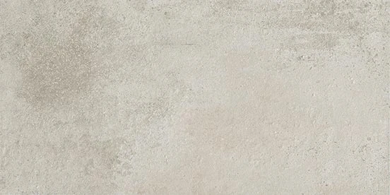 The contemporary, multi-layered look of Atlas Concorde USA's Rift Chalk 12x24 porcelain tile -sample